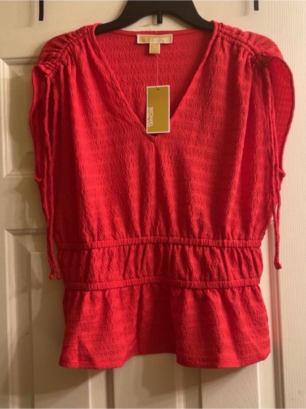 Michael Kors Coral-Red Textured V-Neck Peplum Blouse